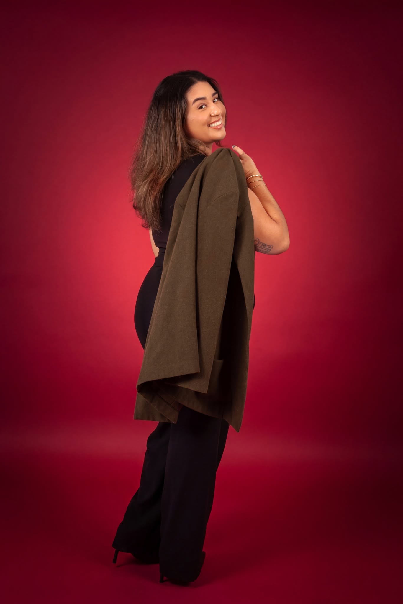 Business branding portrait on a red studio background