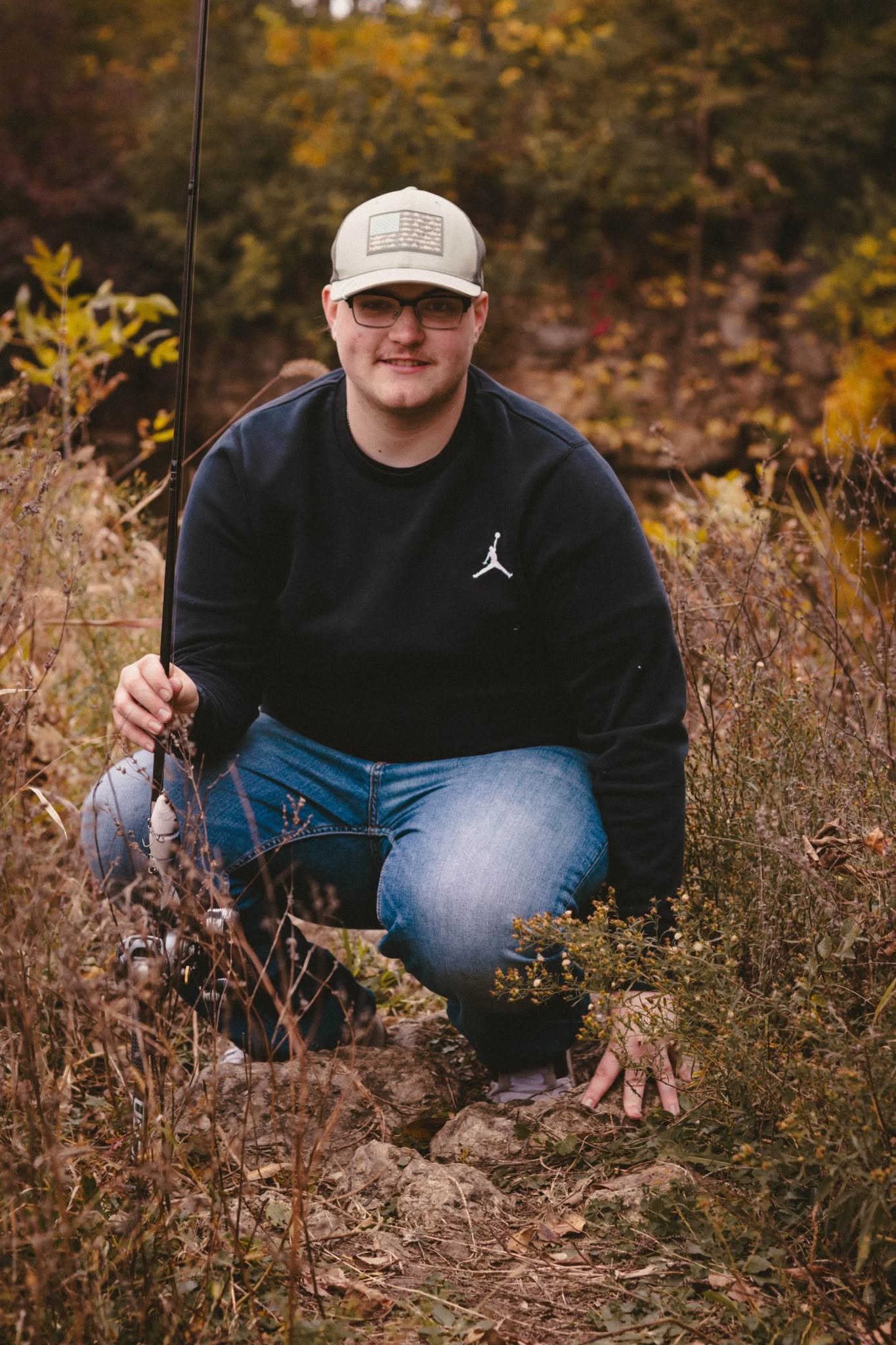 Outdoor lifestyle portrait with fishing gear